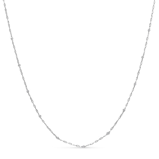 White necklace with a thin chain featuring round white gemstones in bezel settings, shown flat on a white background from the front angle.