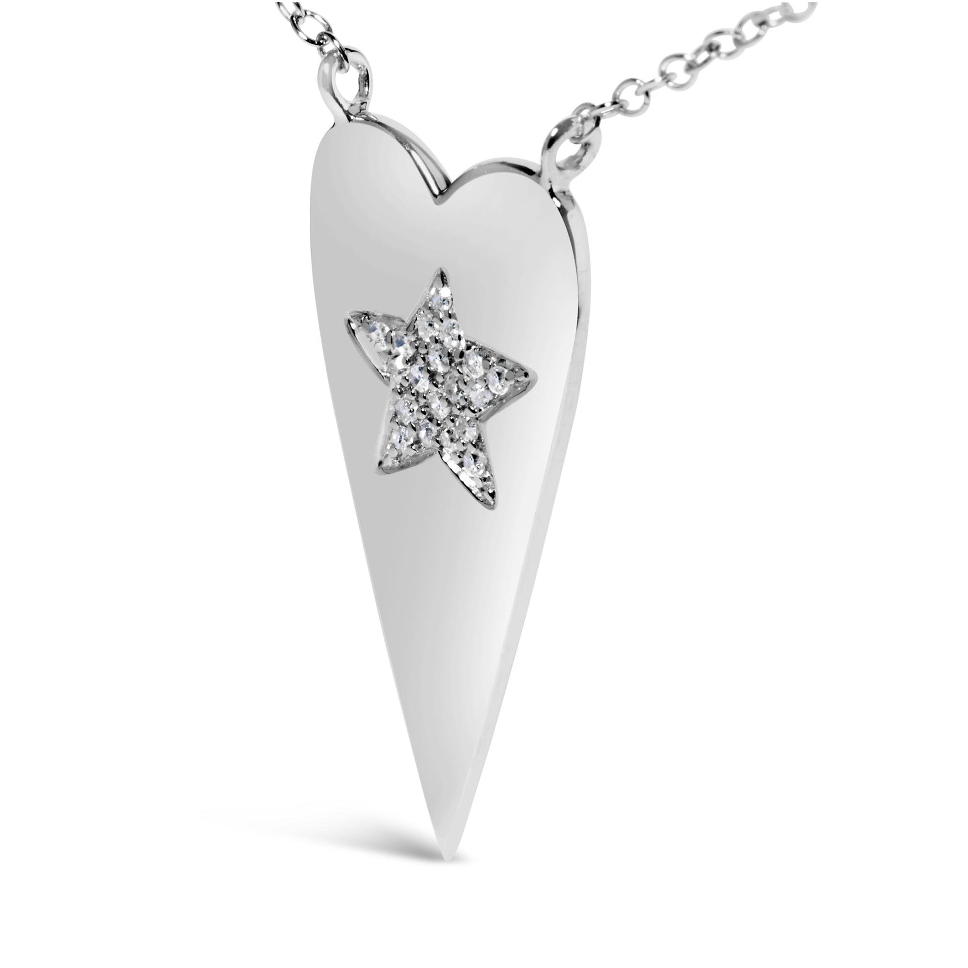 Close-up front angle of a white metal heart-shaped necklace pendant with a star inset decorated with prong-set round white gemstones, shown isolated on a white background.