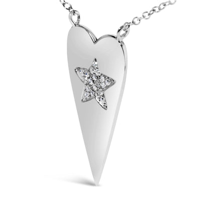 Close-up front angle of a white metal heart-shaped necklace pendant with a star inset decorated with prong-set round white gemstones, shown isolated on a white background.