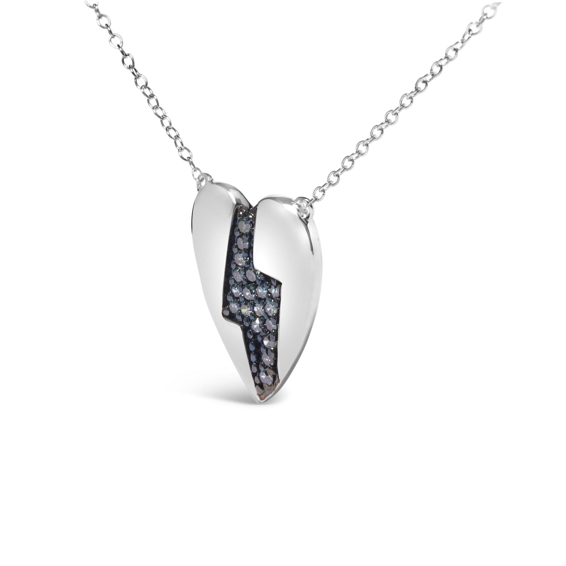 Front angle of white metal heart-shaped necklace pendant with a lightning bolt-shaped inset of round blue prong-set gemstones.