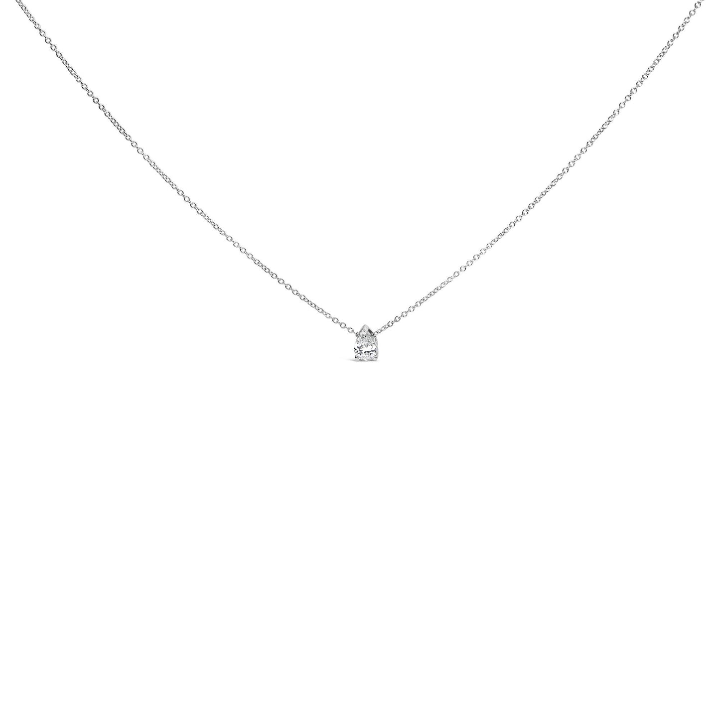 Front angle view of a white metal necklace with a single pear-shaped white gemstone in prong setting pendant.
