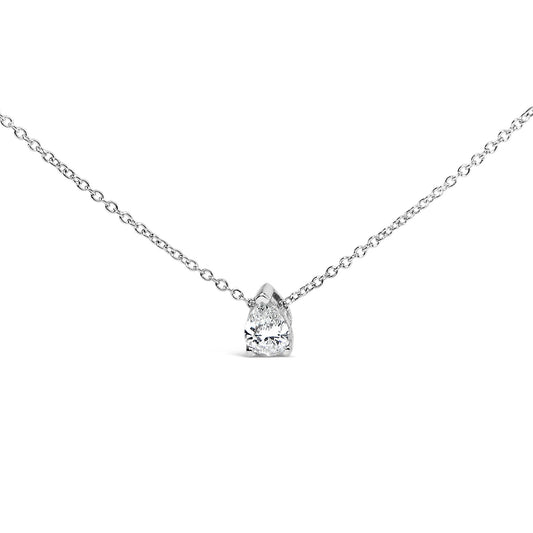 Front angled view of a white metal necklace with a pear-shaped white gemstone in a prong setting.