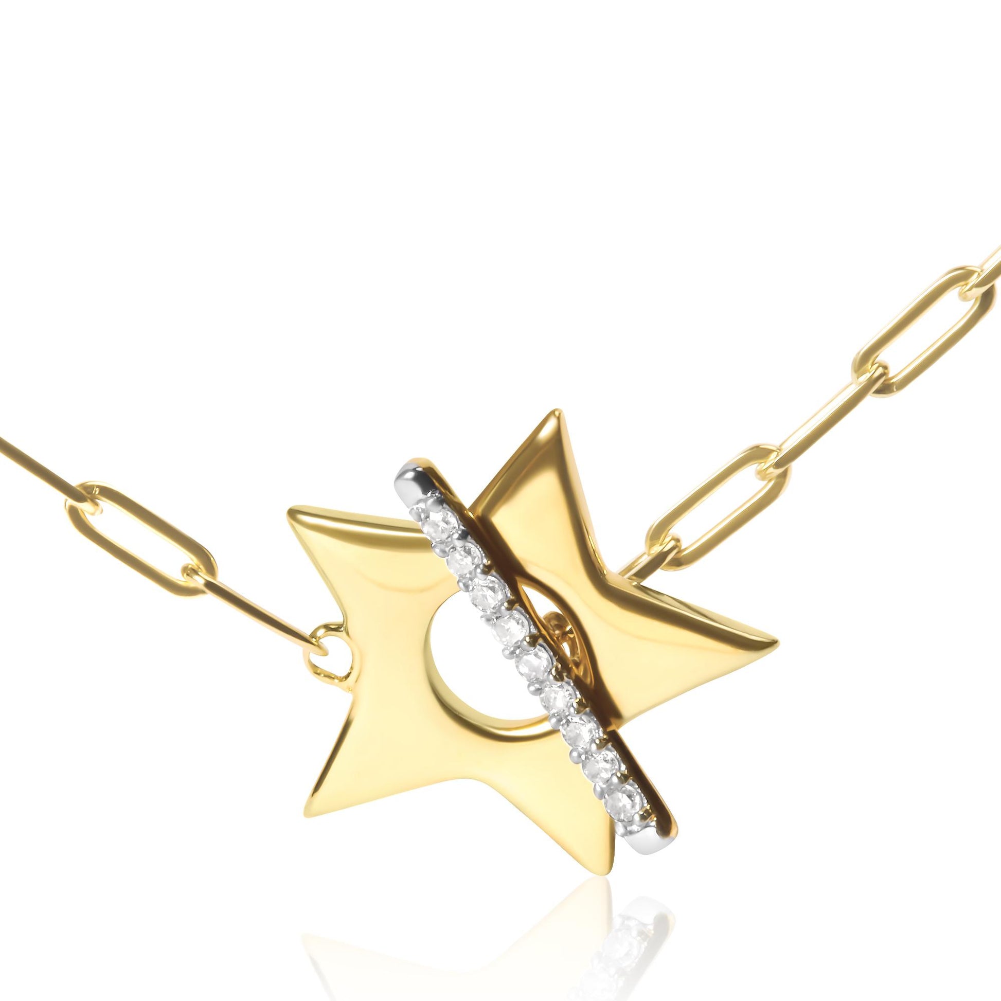 Yellow metal necklace with a star-shaped pendant featuring a circle center and a bar set with round white gemstones, shown in a close-up front angle.