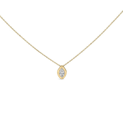 Close-up front view of a yellow metal necklace with a marquise-shaped white gemstone in a bezel setting pendant.