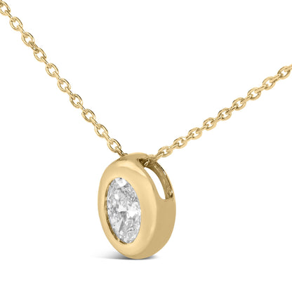 Close-up front angle of a yellow necklace with an oval-shaped white gemstone in a bezel setting pendant.
