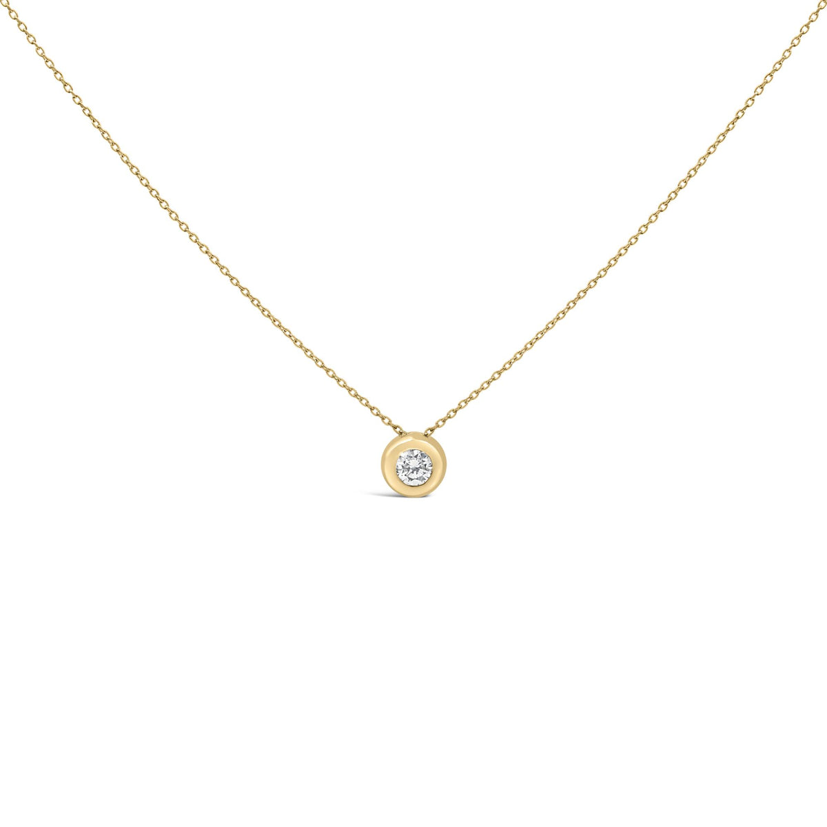 Close-up front view of a yellow necklace with a round white gemstone in a bezel setting, shown against a white background.