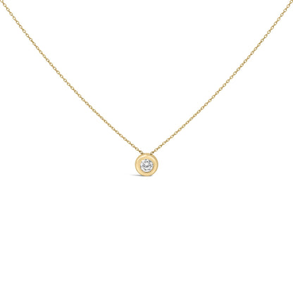Close-up front view of a yellow necklace with a round white gemstone in a bezel setting, shown against a white background.