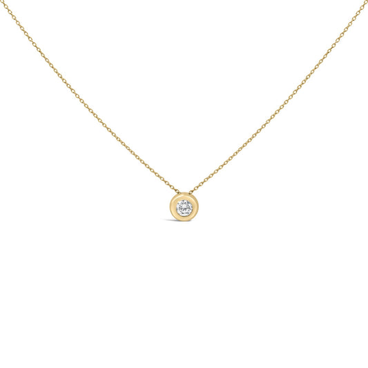 Close-up front view of a yellow necklace with a round white gemstone in a bezel setting, shown against a white background.