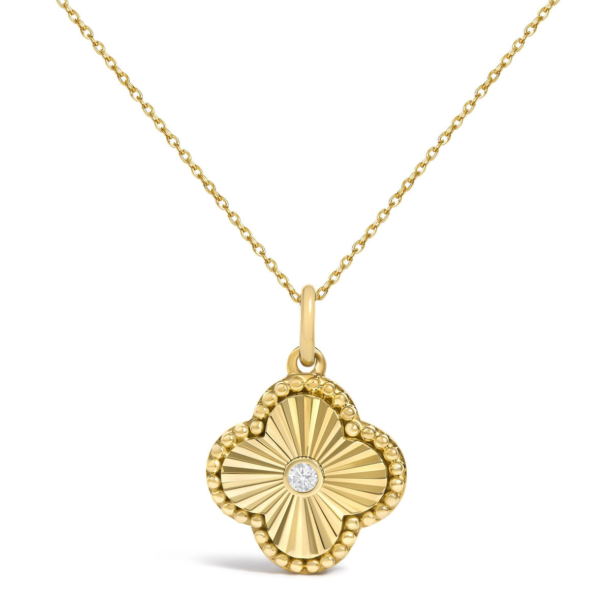 Close-up front view of a yellow necklace chain with a four-leaf clover-shaped pendant featuring a textured surface and a central round white gemstone in a bezel setting.