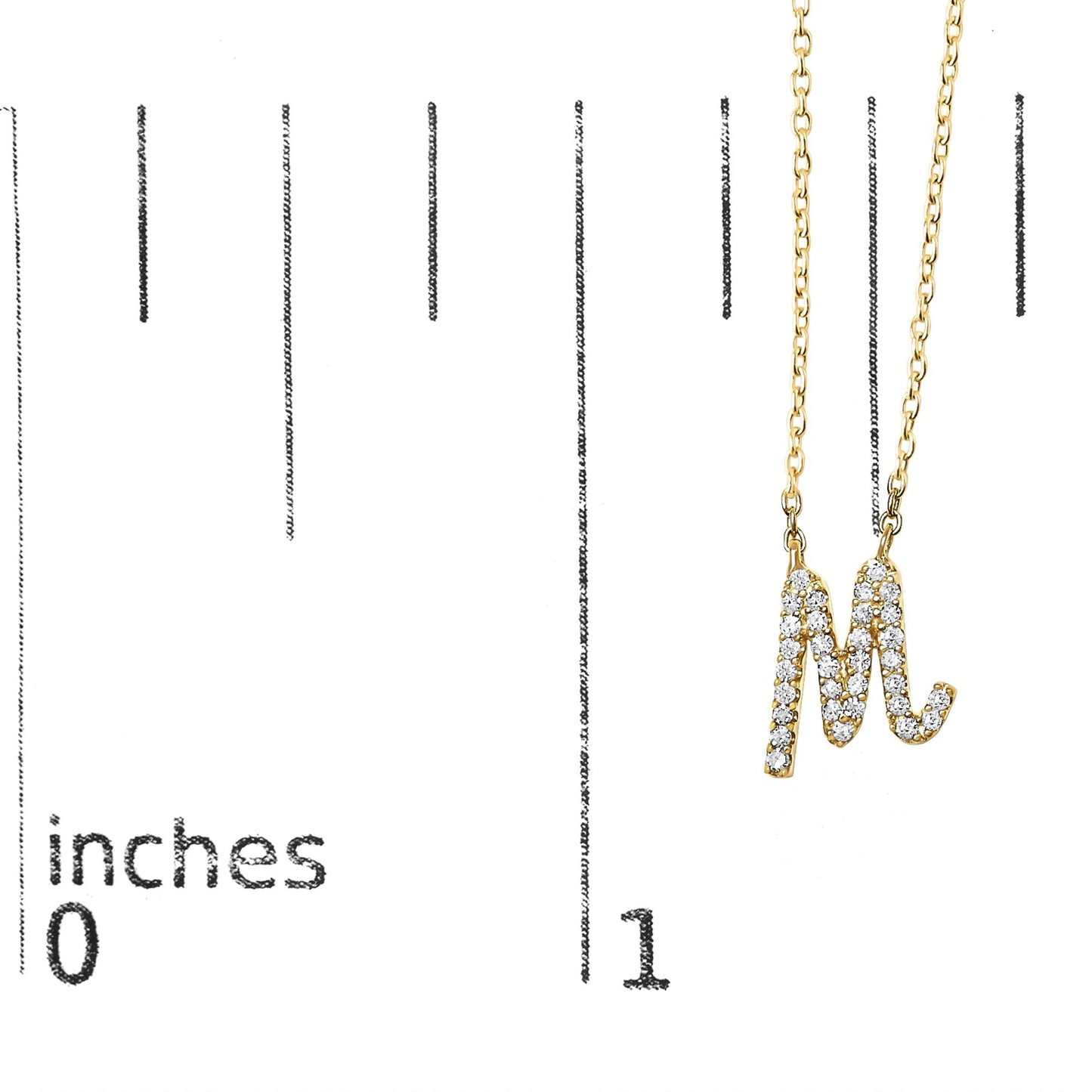 Close-up front angle of a yellow metal necklace pendant shaped like the letter M, encrusted with round white gemstones in a micro-pave setting, shown on a scale.