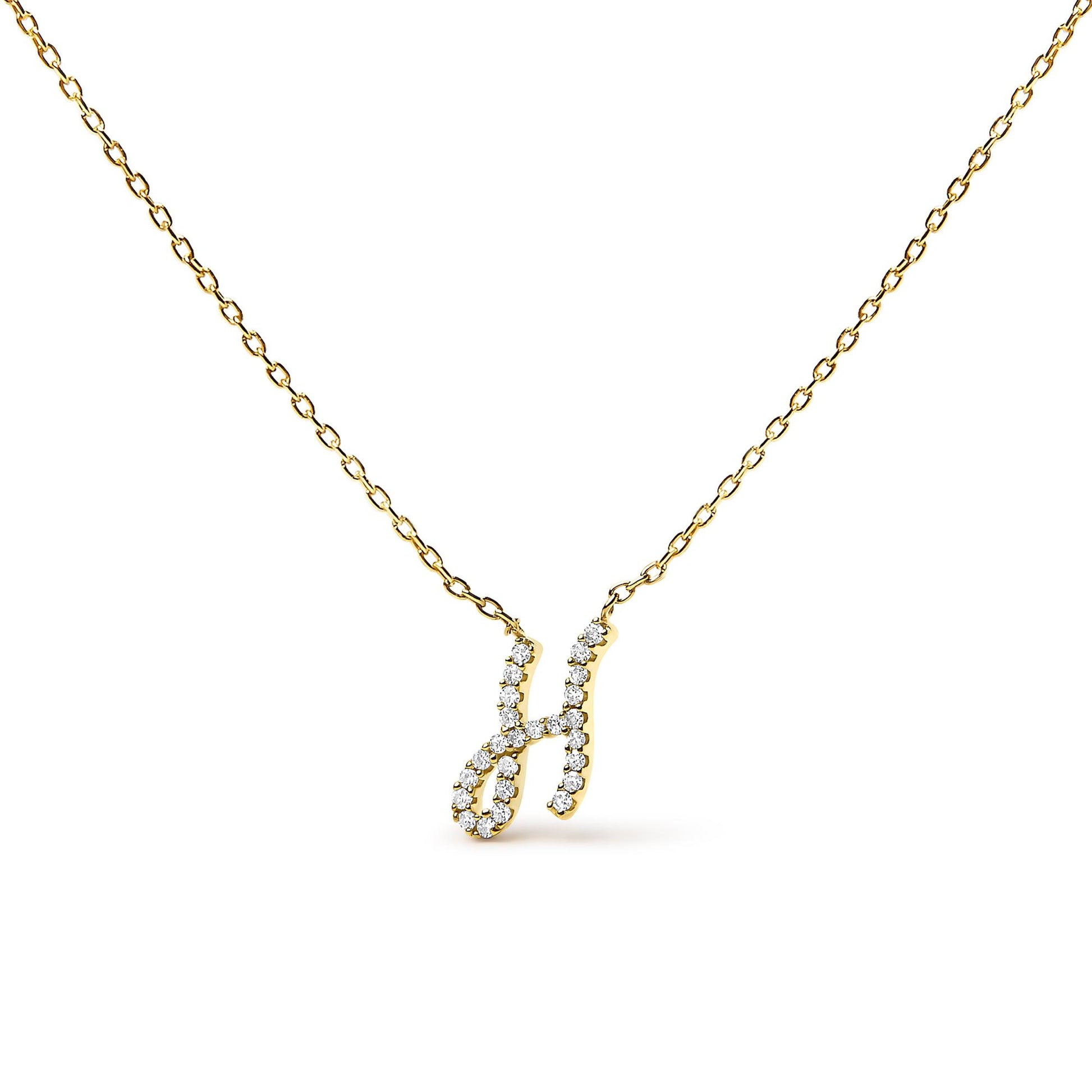 Close-up front view of a yellow necklace with a pendant shaped like the letter H, studded with small white round gemstones in a micro-pave setting.
