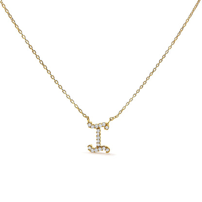 Front angle view of a yellow metal necklace with a pendant shaped like the letter I encrusted with round white gemstones in micro-pave setting.