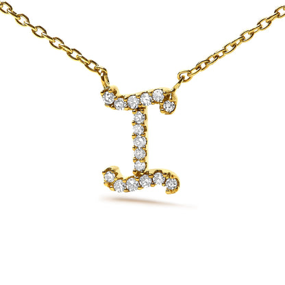 Close-up front view of a yellow metal necklace with a pendant shaped like the letter 'I' adorned with round white gemstones in a micro-pave setting.