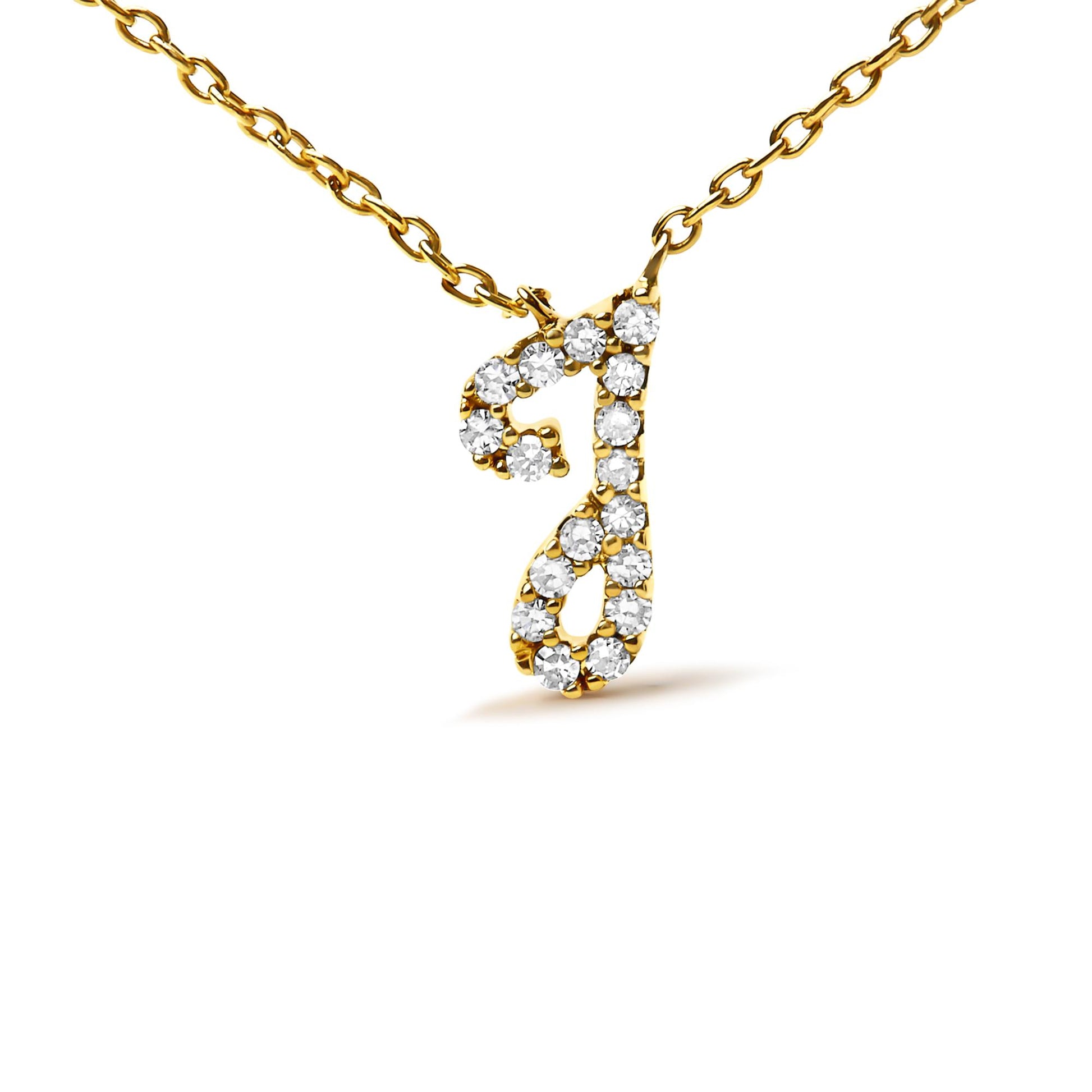 Close-up front view of a yellow metal necklace with a pendant in the shape of a stylized letter 'J' adorned with round white gemstones in a micro-pave setting.