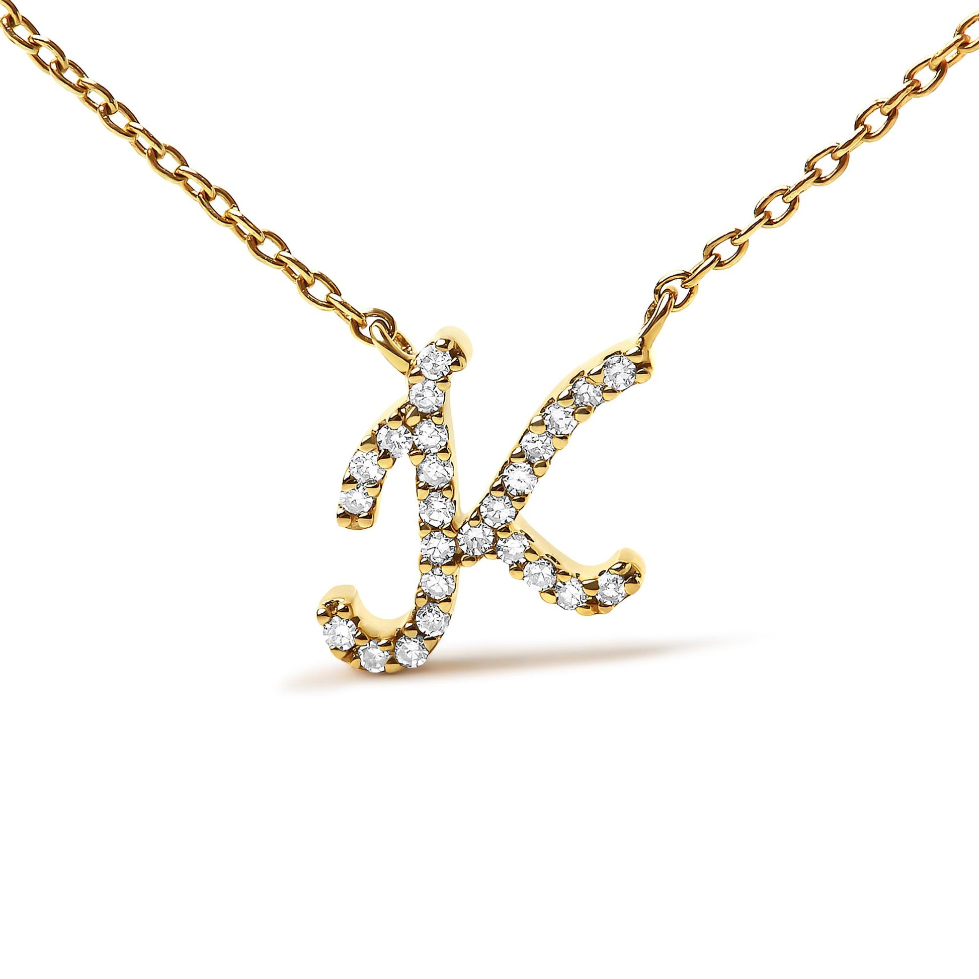 Close-up front view of a yellow metal necklace featuring a letter 'K' pendant adorned with round white gemstones in a micro-pave setting.