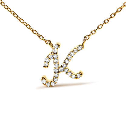 Close-up front view of a yellow metal necklace featuring a letter 'K' pendant adorned with round white gemstones in a micro-pave setting.