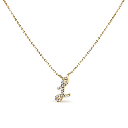 Yellow metal necklace with a pendant shaped like a stylized letter, adorned with small white gemstones in a micro-pave setting, shown in a front-facing angle on a white background.