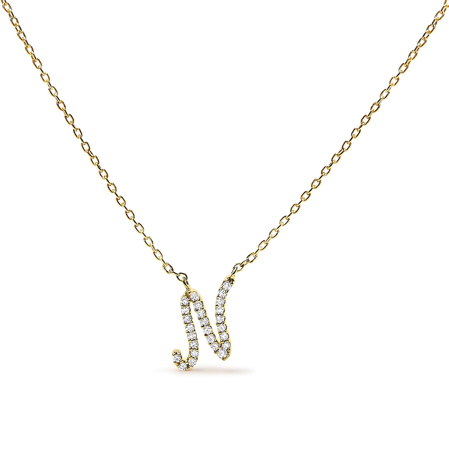 Front-facing close-up of a yellow necklace with a pendant shaped like the letter 'N' adorned with white gemstones in a micro-pave setting.