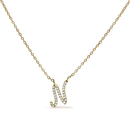 Front-facing close-up of a yellow necklace with a pendant shaped like the letter 'N' adorned with white gemstones in a micro-pave setting.