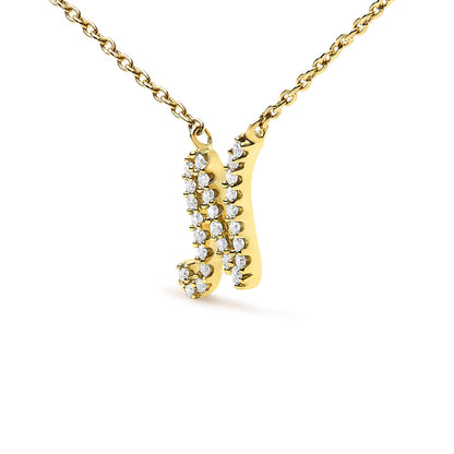 Close-up front angle of a yellow metal necklace pendant featuring a vertical bar and a curved design, both adorned with small white gemstones in a micro-pave setting, hanging from a chain.