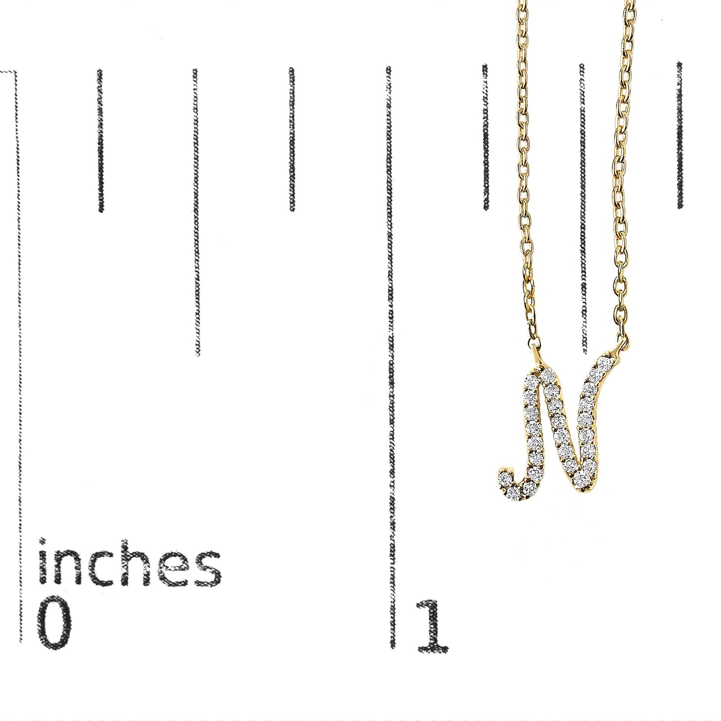 Yellow metal necklace pendant shaped like the letter N, decorated with multiple white round gemstones in a micro-pave setting, shown on a scale from a front angle.