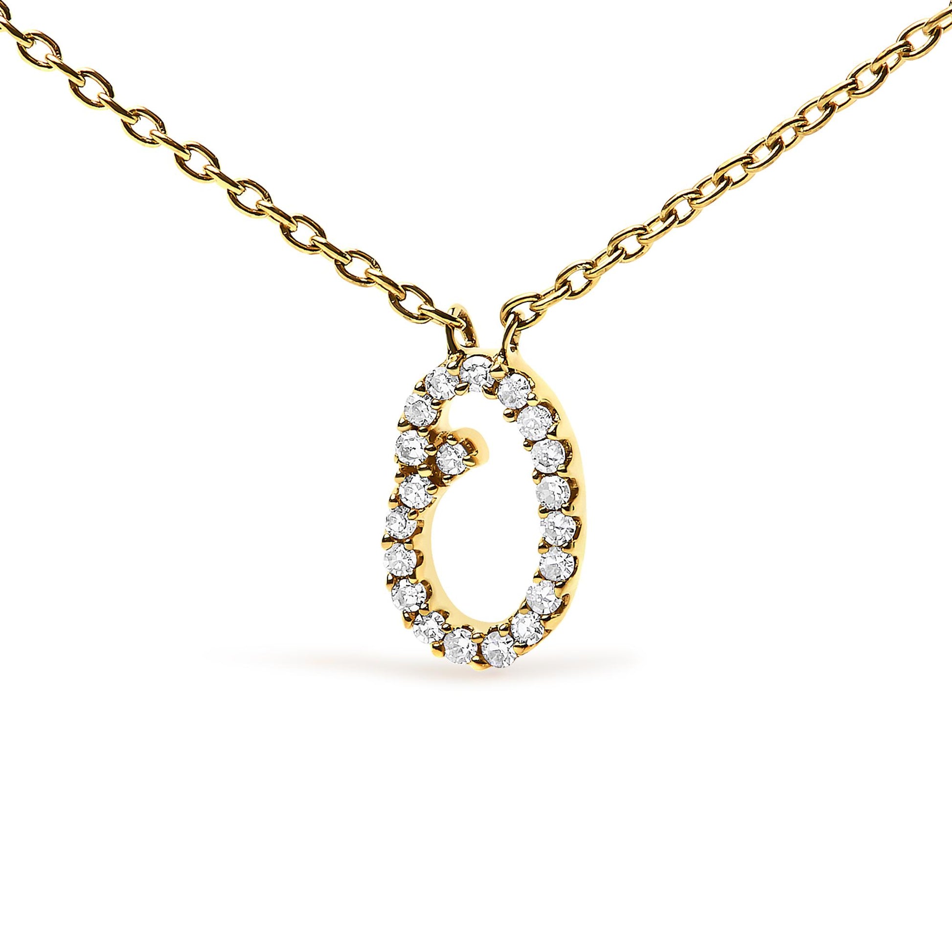 Close-up front view of a yellow metal necklace with an oval-shaped pendant outlined with round white gemstones in a micro-pave setting.