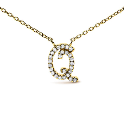 Close-up front angle of a yellow metal necklace with a pendant shaped as the letter Q, adorned with round white gemstones in a micro-pave setting.