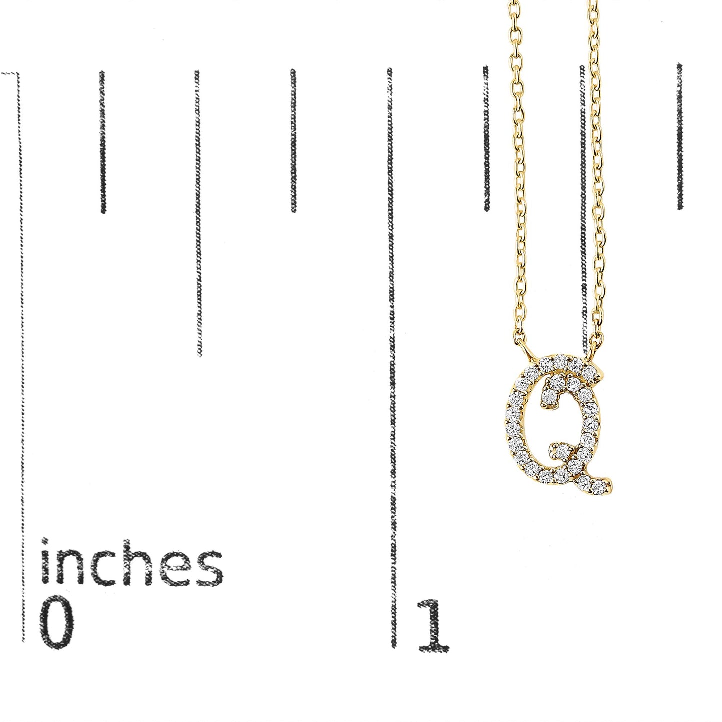 Close-up front view of a yellow necklace pendant shaped like the letter Q adorned with round white gemstones in a micro-pave setting, shown on a scale.