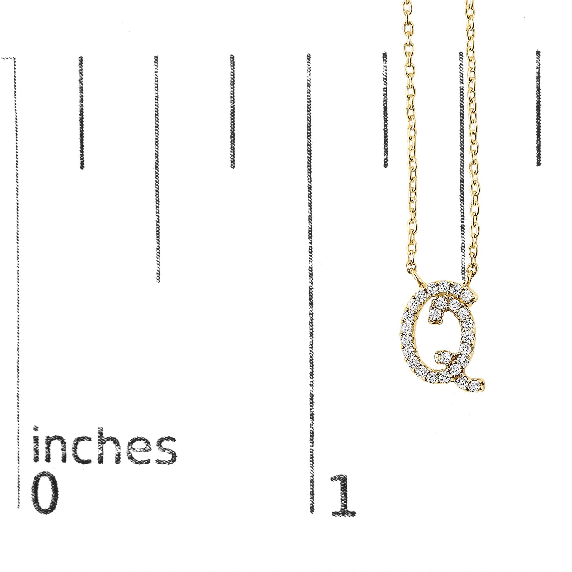 Close-up front view of a yellow necklace pendant shaped like the letter Q adorned with round white gemstones in a micro-pave setting, shown on a scale.
