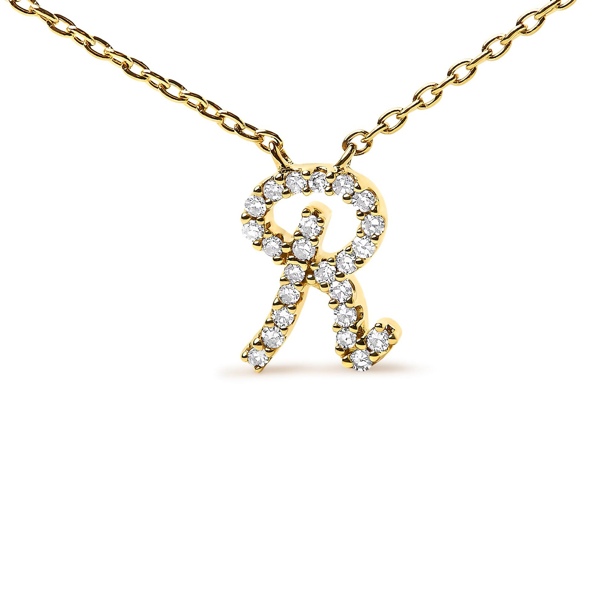 Front view of a yellow metal necklace with a pendant shaped like the letter 'R' adorned with round white gemstones in a micro-pave setting.
