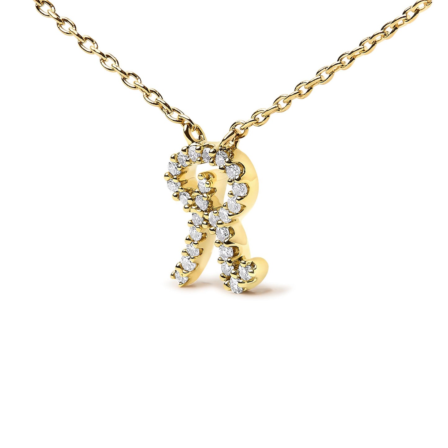 Close-up front angle of a yellow metal necklace with a pendant shaped like the letter R, adorned with small white gemstones in a micro-pave setting.