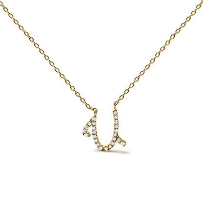 Close-up front view of a yellow metal necklace with a letter-shaped pendant adorned with round white gemstones in a micro-pave setting.