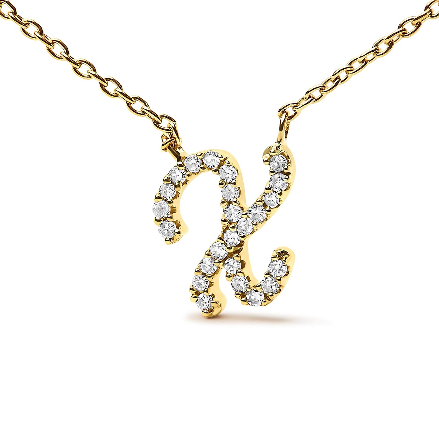 Close-up front angle of a yellow metal necklace pendant in a script letter shape adorned with white round gemstones in a micro-pave setting, shown isolated on a white background.
