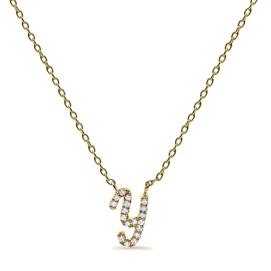 Front-facing shot of a yellow metal necklace with a pendant shaped like a lowercase letter 'y' adorned with small white gemstones in a micro-pave setting.