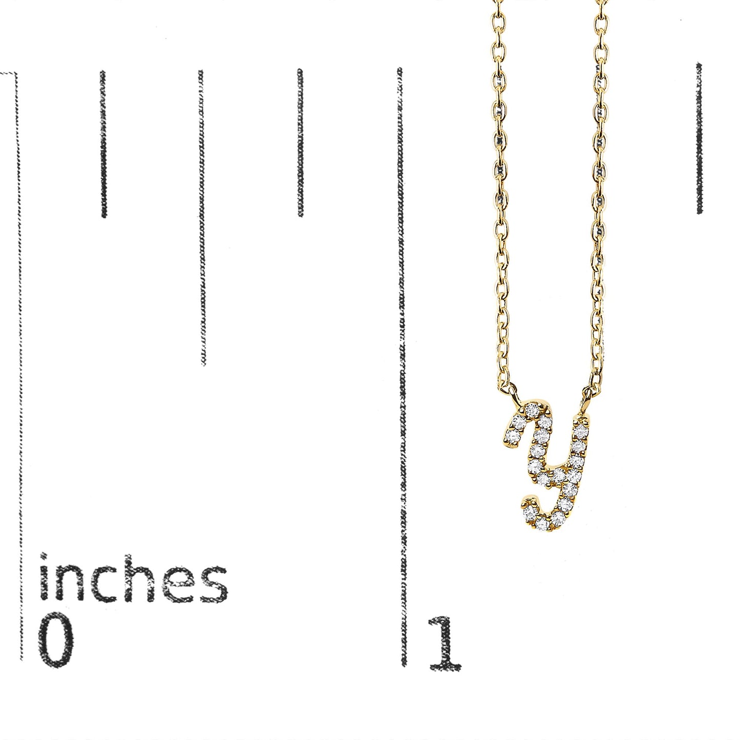 Close-up front view of a yellow necklace shown on a scale, featuring a pendant shaped like the letter 'y' adorned with white round gemstones in micro-pave setting.
