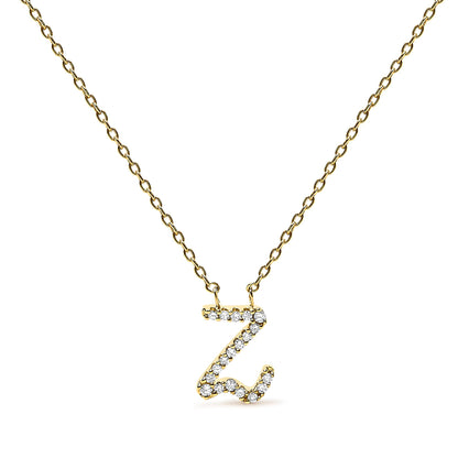 Front-facing close-up of a yellow metal necklace with a pendant shaped like the letter 'Z,' adorned with small round white gemstones in a micro-pave setting.