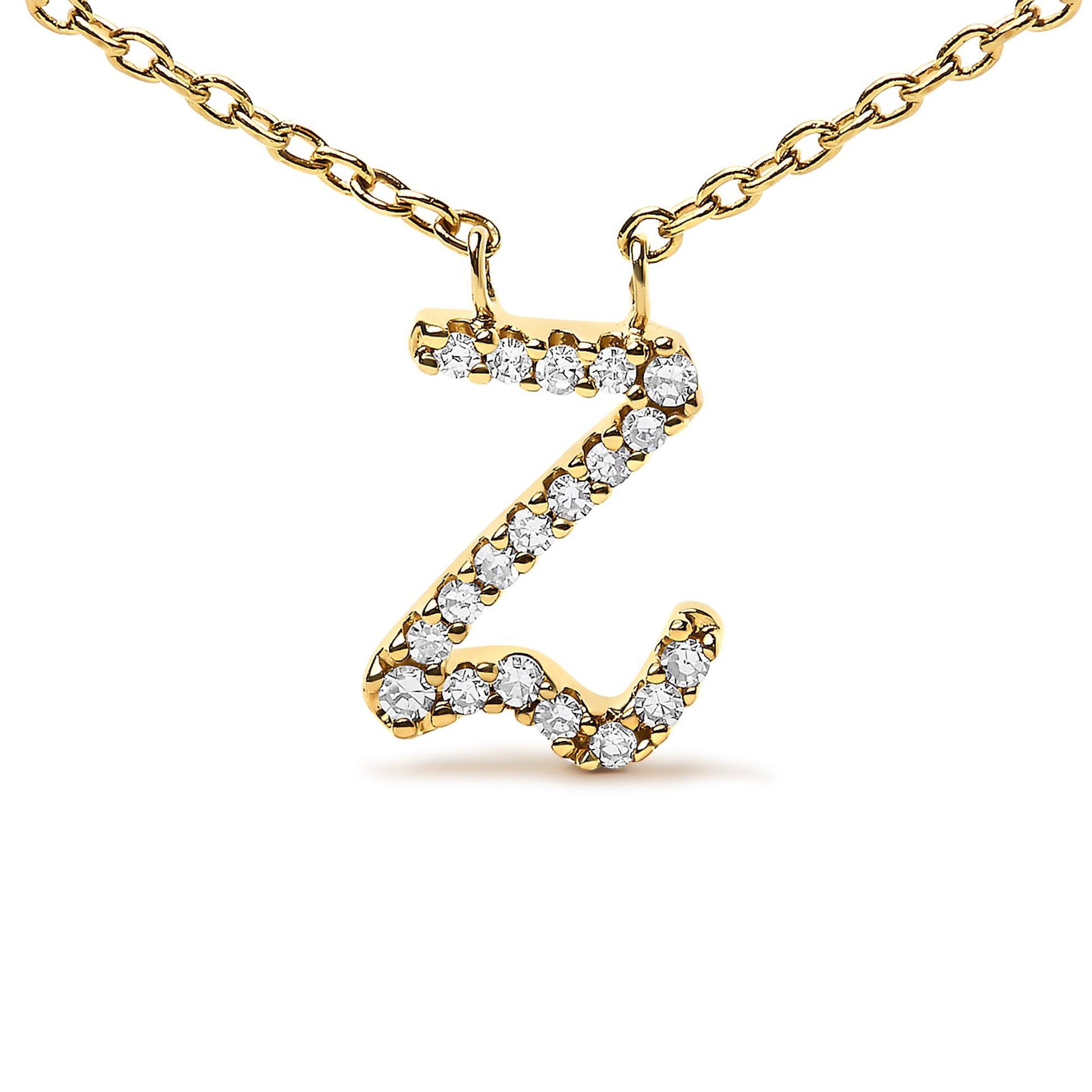 Close-up front view of a yellow metal necklace pendant in the shape of the letter Z, adorned with round white gemstones in a micro-pave setting, displayed on a white background.