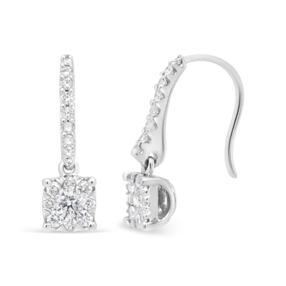 Front and side view of white metal earrings with round white gemstones in prong and pave settings.