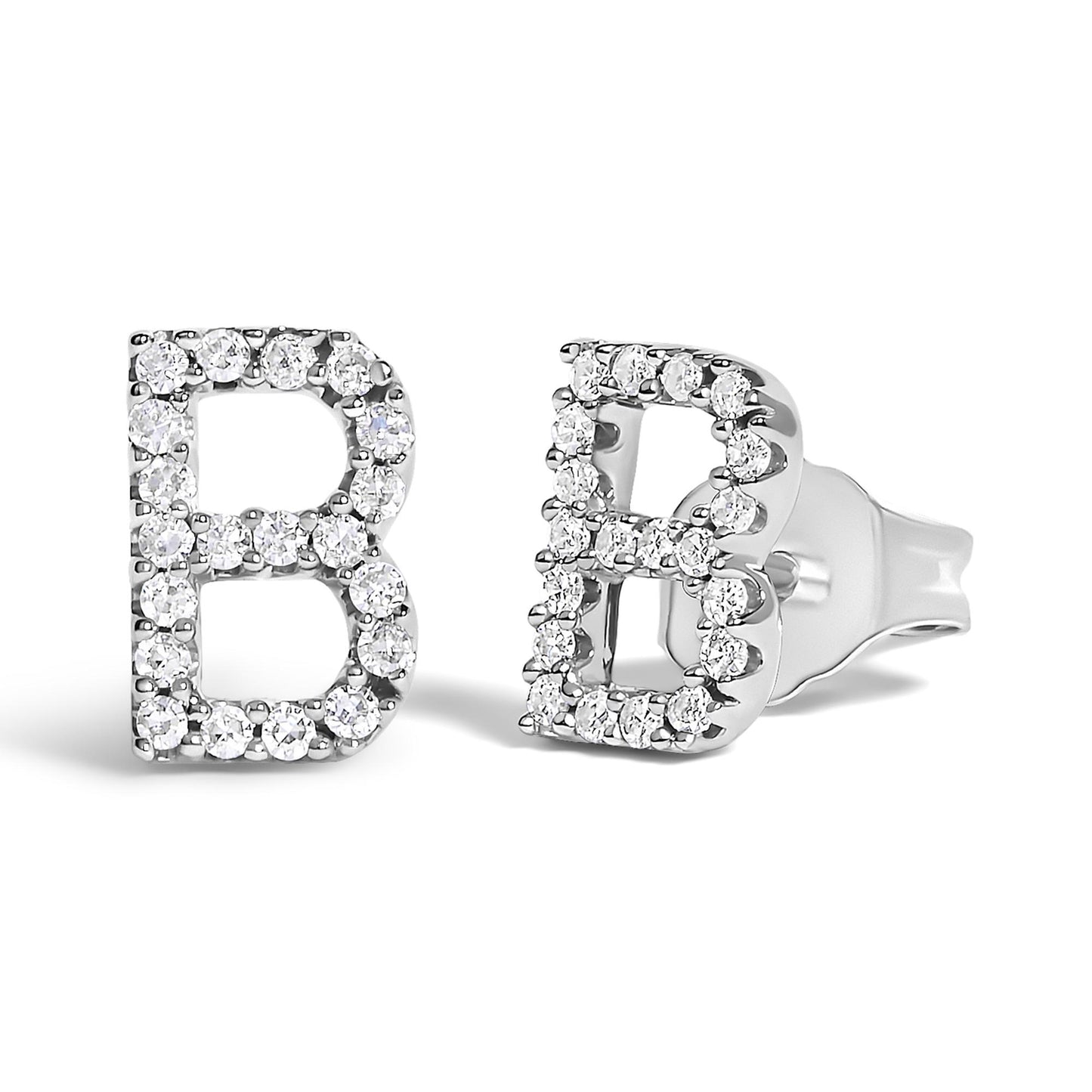 Close-up front and side angle view of white metal earrings shaped like the letter B, adorned with round white gemstones in a micro-pave setting, shown on a white background.