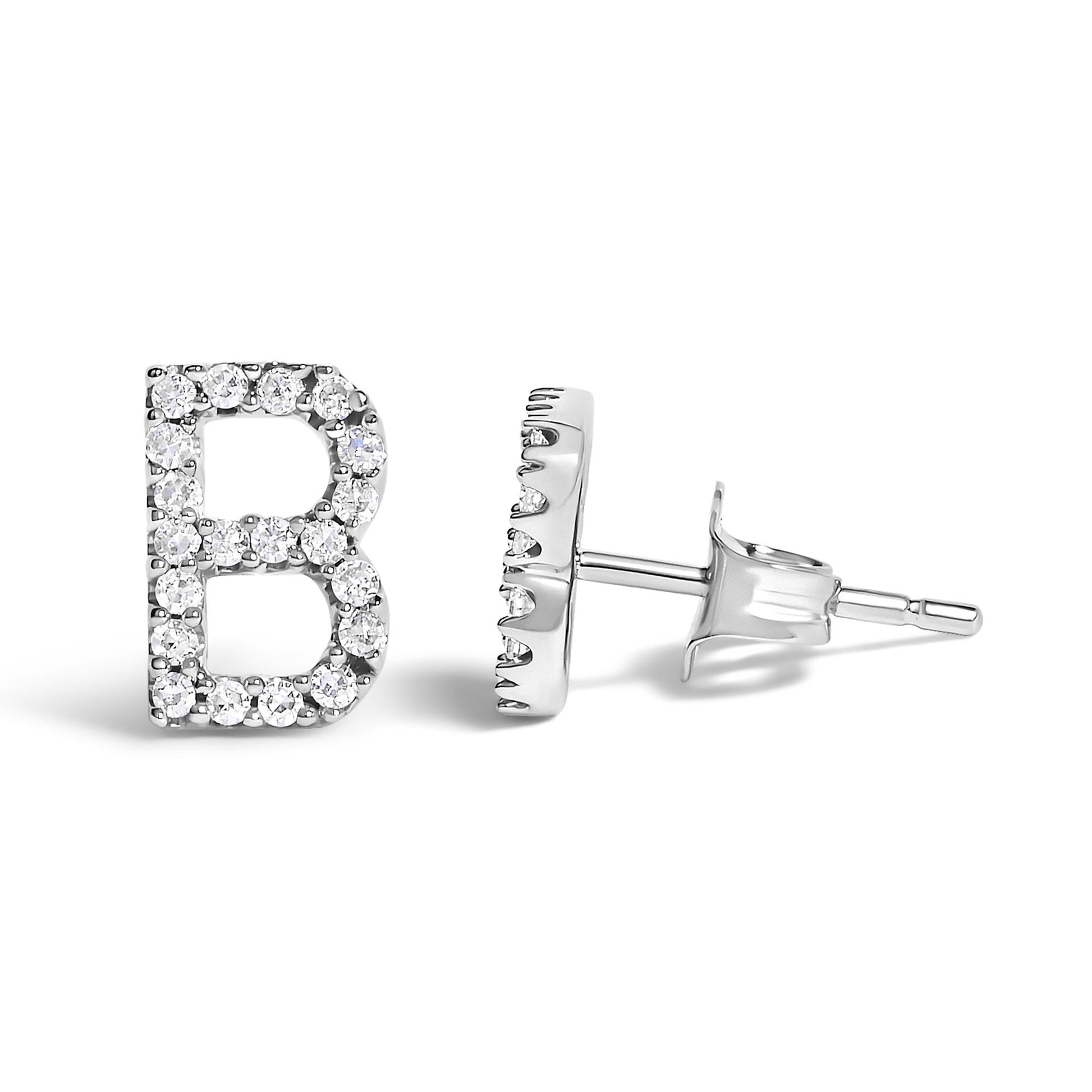 Close-up side and front angled shot of white metal stud earrings shaped like the letter B, featuring round white gemstones in a micro-pave setting.