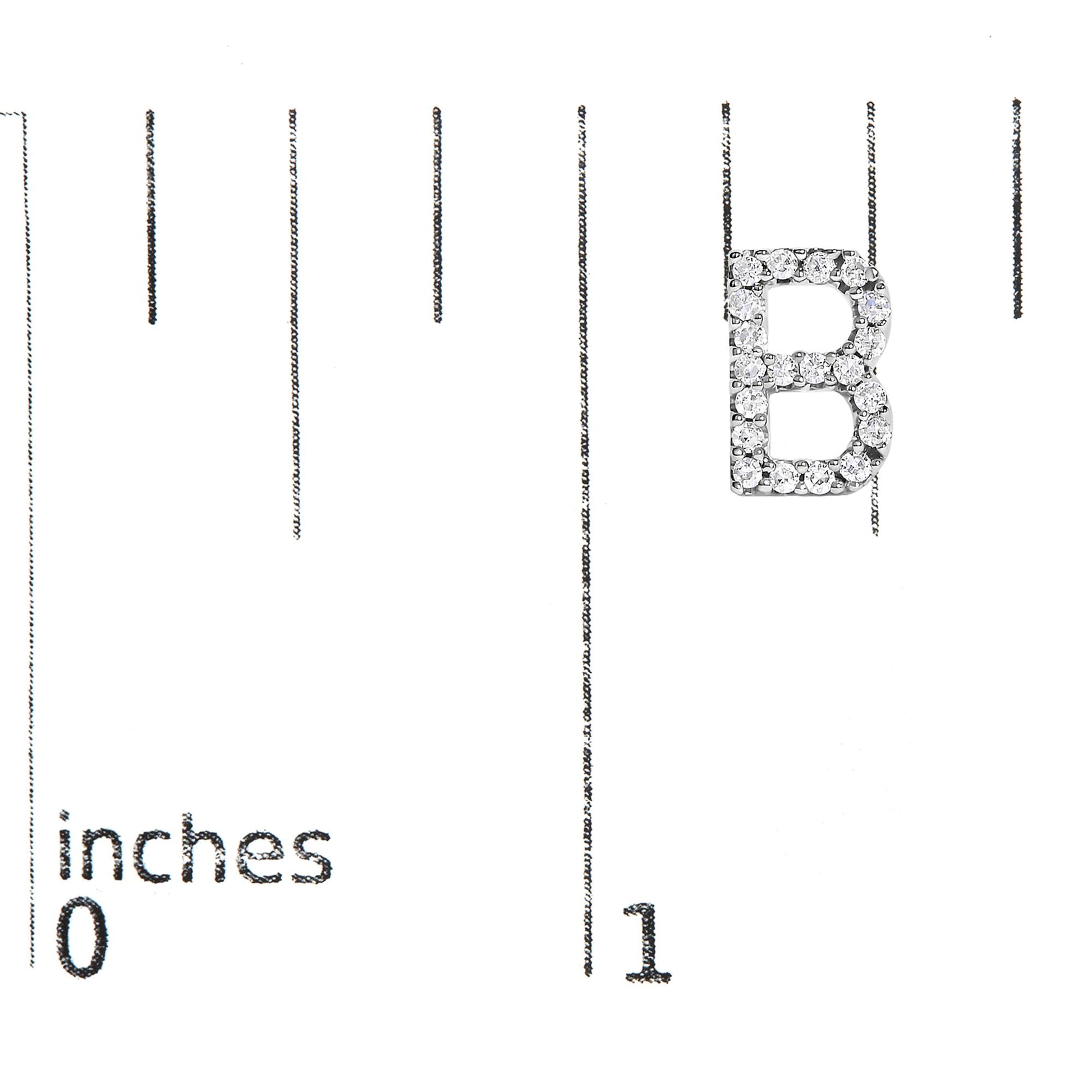 Close-up front view of a white metal earring shaped like the letter B, encrusted with round white gemstones in a micro-pave setting, shown on a measurement scale.
