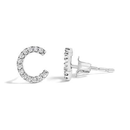 Pair of white metal crescent-shaped stud earrings with round white gemstones in micro-pave setting, shown in a side and front angle on a white background.