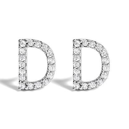 Front view of a pair of white metal earrings shaped like the letter D, each outlined with round white gemstones in micro-pave setting.