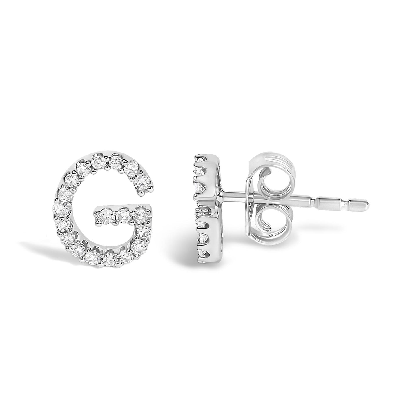 Close-up shot of white metal stud earrings shaped like the letter G, adorned with round white gemstones in a micro-pave setting, shown side by side with one front-facing and one side view.