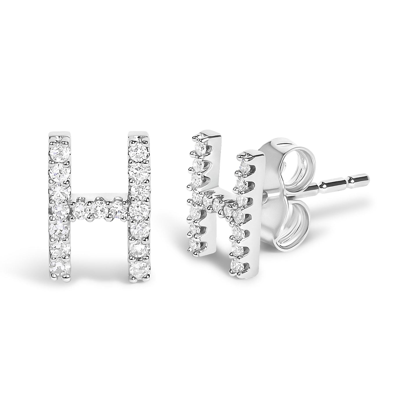 Close-up front and side view of white metal stud earrings shaped like the letter H, each adorned with round white gemstones in a micro-pave setting.