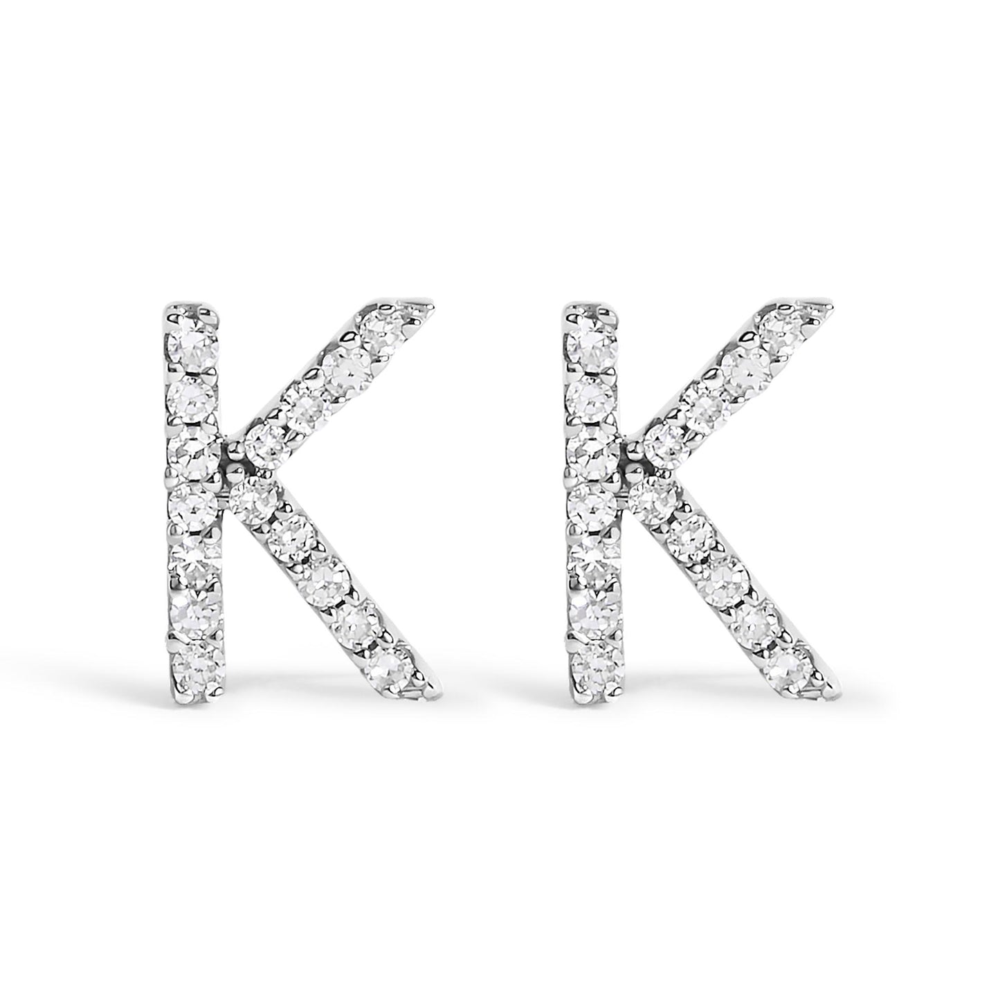 Front view of white metal earrings shaped like the letter K, set with round white gemstones in a micro-pave setting.