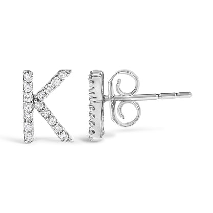 Front and side view of white metal stud earrings shaped as the letter K, set with small round white gemstones in a micro-pave setting, shown on a white background.