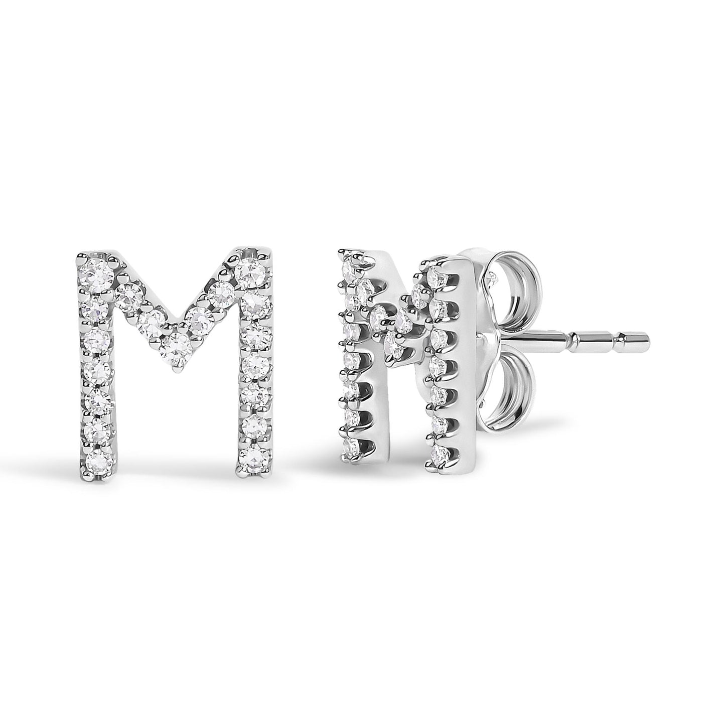 Pair of white metal stud earrings shaped like the letter M, adorned with round white gemstones in a micro-pave setting, shown from the front and side on a white background.