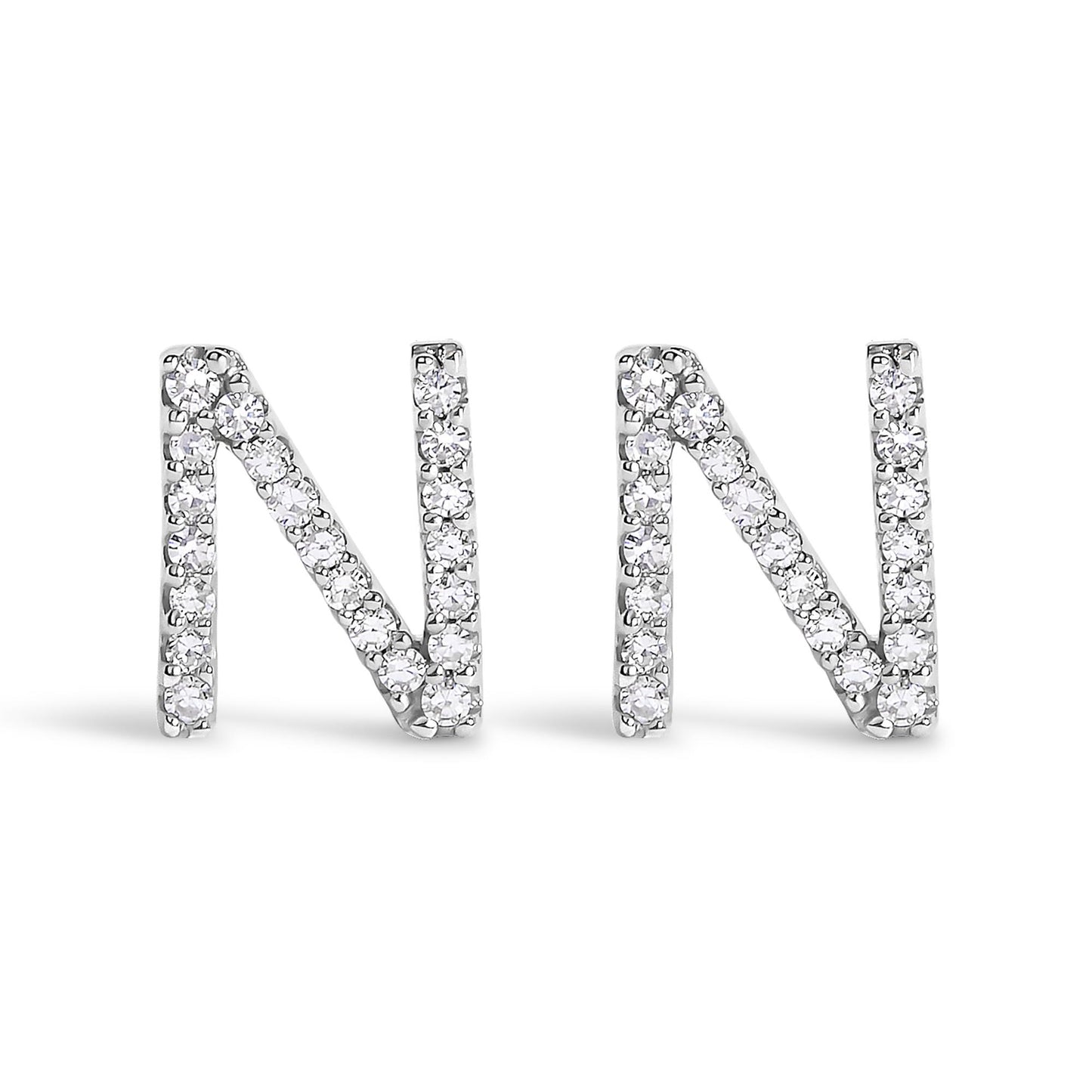 Front view of a pair of white metal earrings shaped like the letter N, each adorned with round white gemstones in a micro-pave setting.