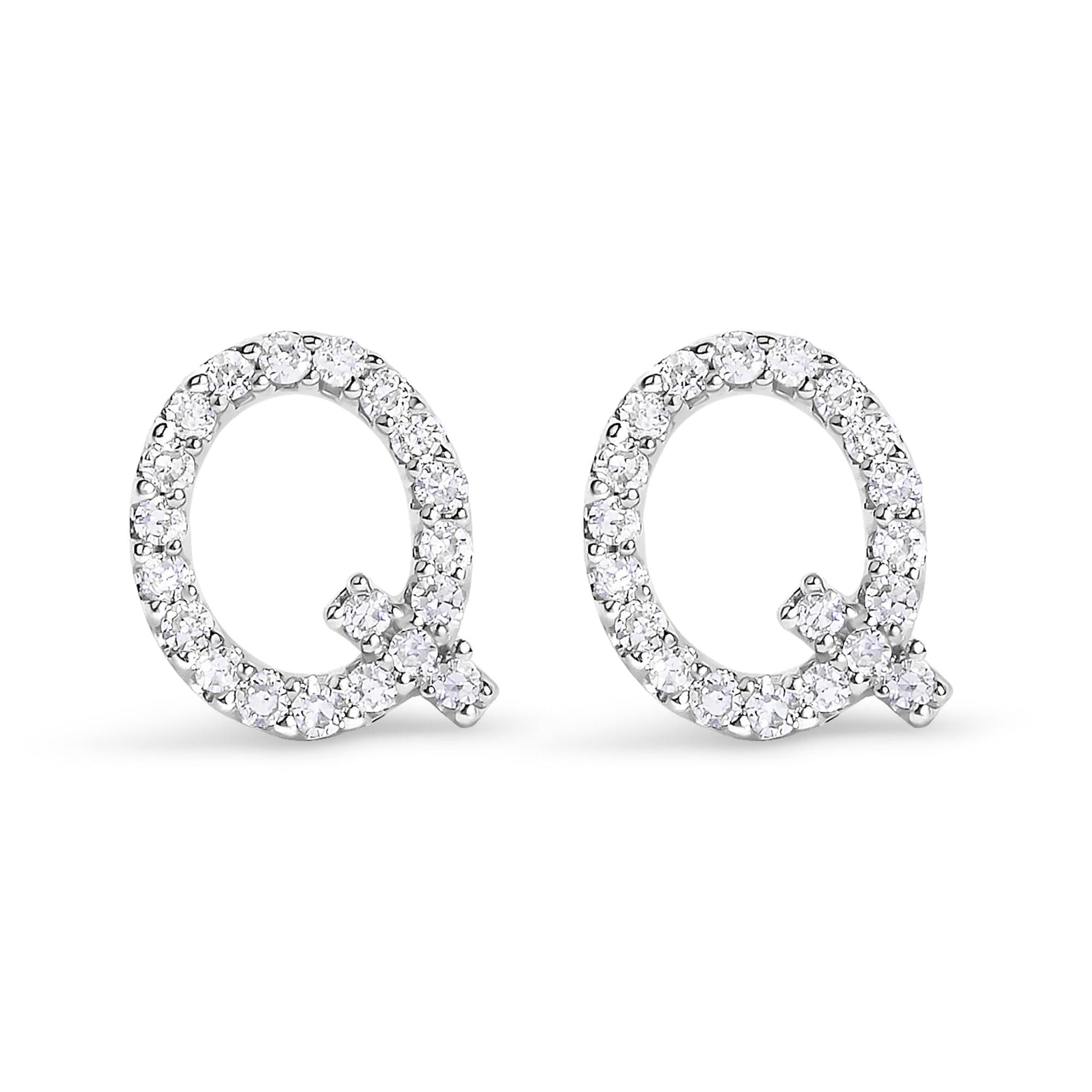 Front view of a pair of white metal open circle earrings featuring round white gemstones in a micro-pave setting.